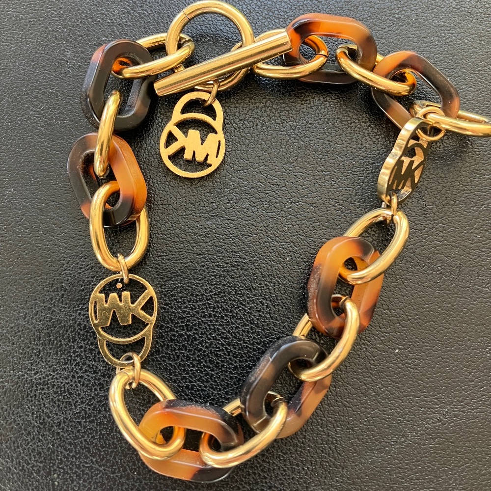 Michael Kors MK Logo Bracelet Gold Tone Tortoise Shell Link Toggle Brace…